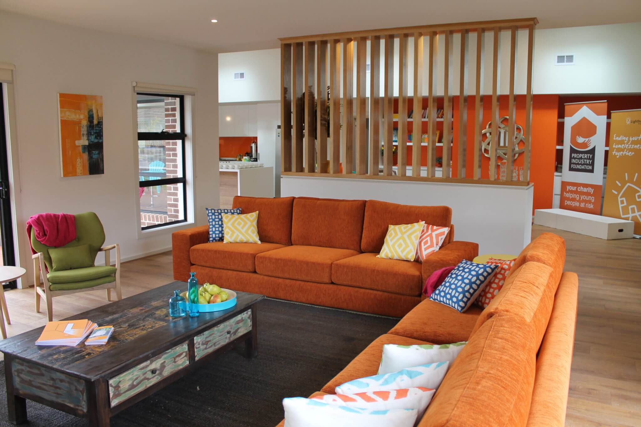 Lounge room- orange couch- bonbeach