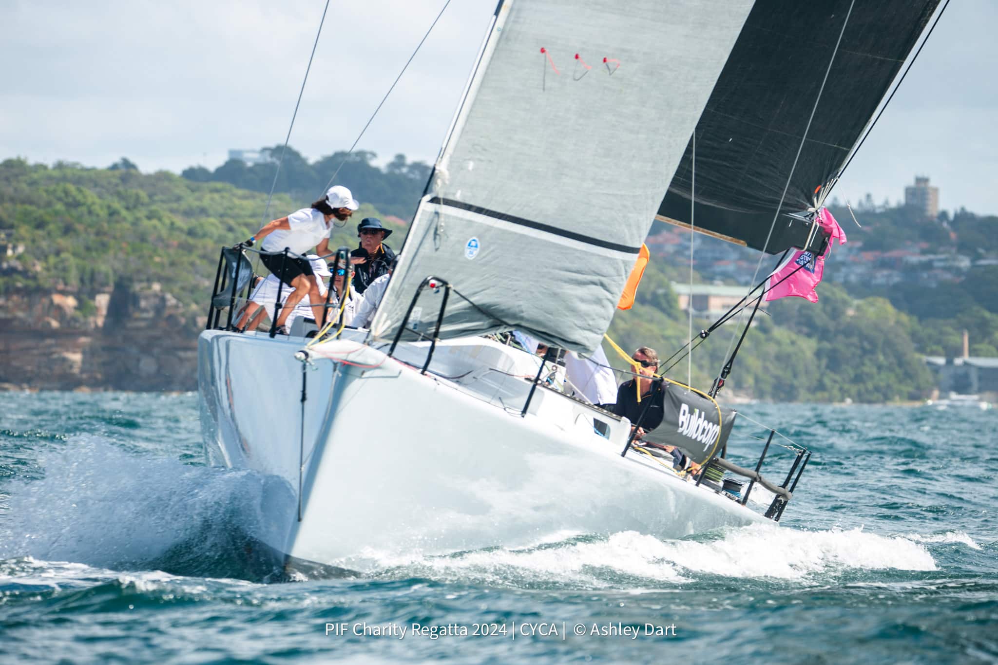 2024 NSW Sydney Charity Regatta Buildcorp zoom crew side race shot