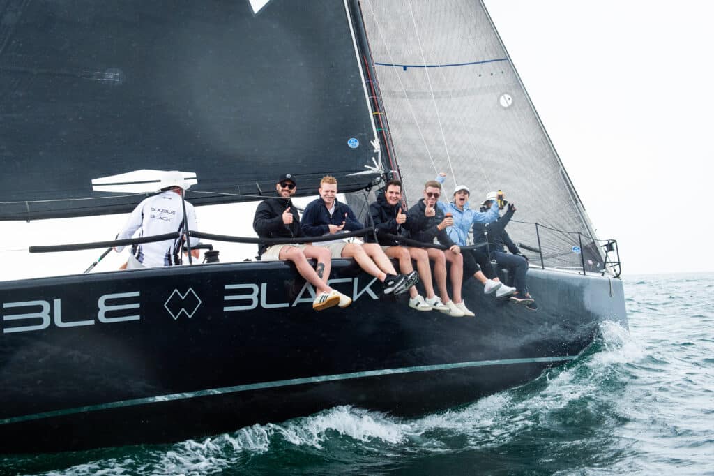 24 QLD - Regatta - Black yacht happy sail shot